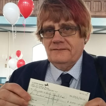 Bernie Collecting Cheque