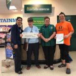 Dawn Deborah receiving Morrisons cheque